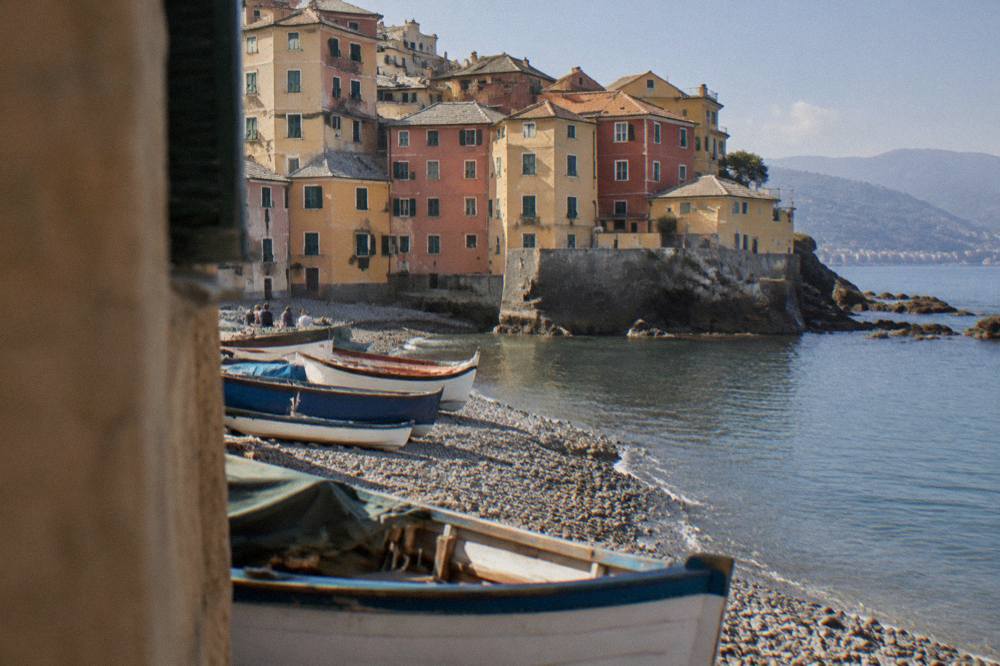 Fishing boats and coloured houses along the water at Boccadasse