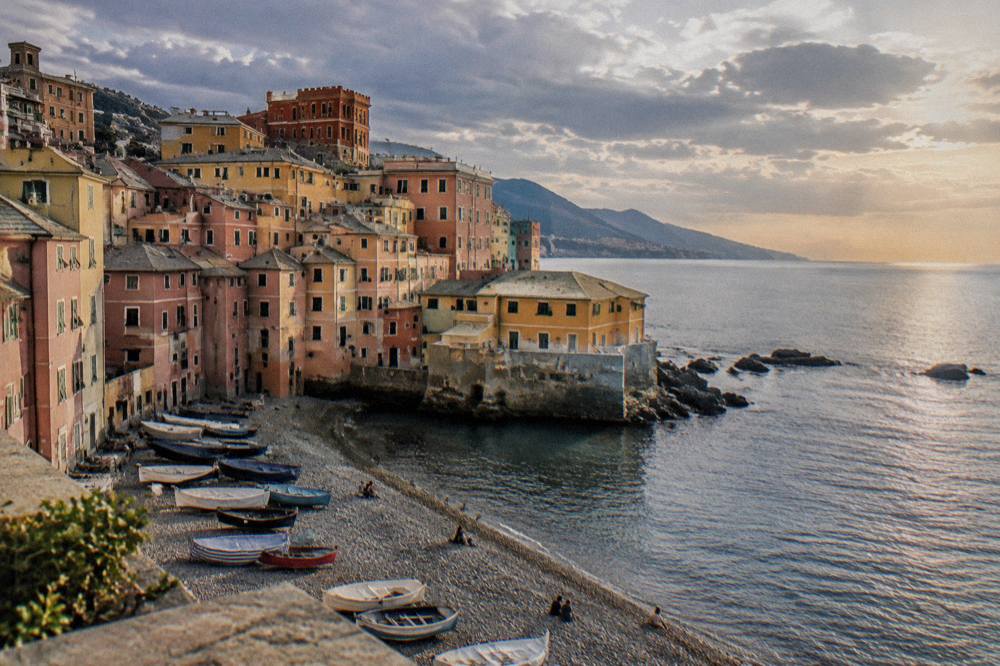Clouds and evening light over the small bay of Boccadasse and the open Ligurian Sea