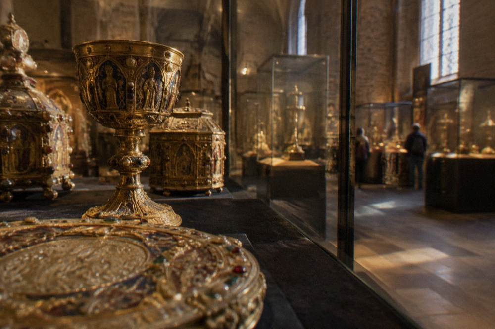 Interior of the treasury museum beside Genoa Cathedral with display cases