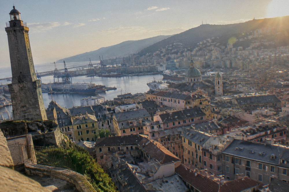 View from the Lanterna's terrace over the harbour cranes and the rooftops of Genoa