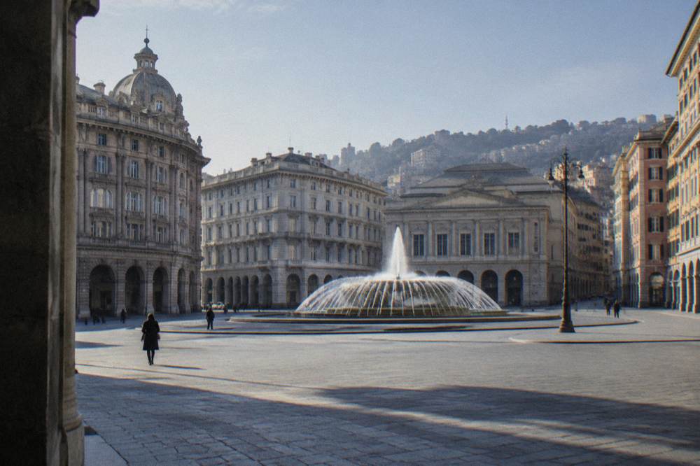 The fountain and surrounding buildings of Piazza De Ferrari a short walk from Palazzo Ducale
