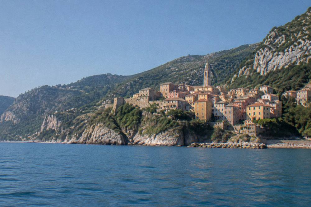 A cliffside village seen from the water on the Ligurian coast