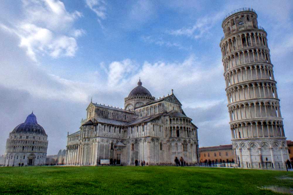 The baptistery dome seen across the monumental square in Pisa