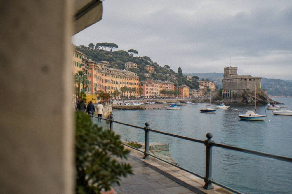 Colourful facades along the Rapallo seafront promenade on a bright day