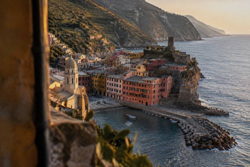 Terraced vineyard slopes descending to colourful villages along the Cinque Terre coast