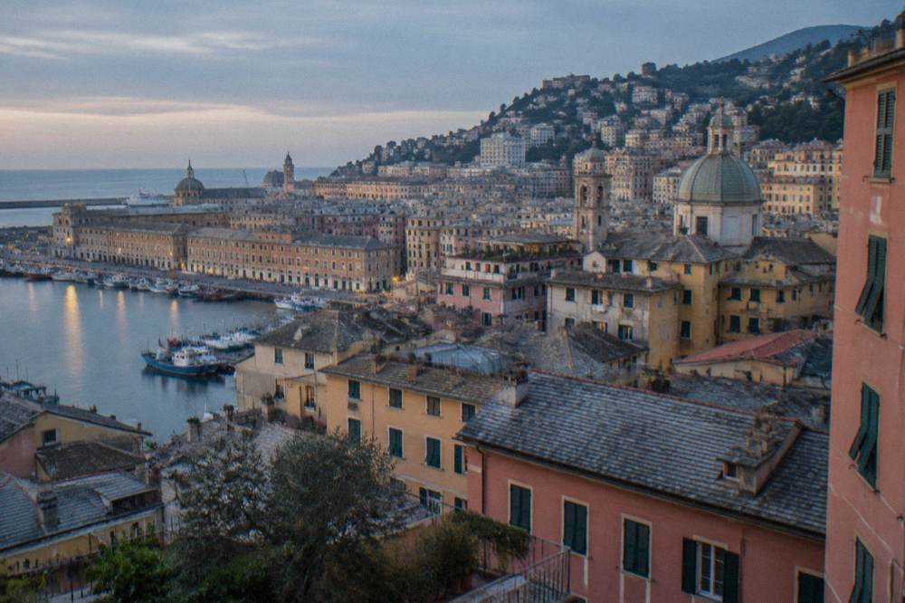 Fishing boats and harbour buildings along the Genoa waterfront