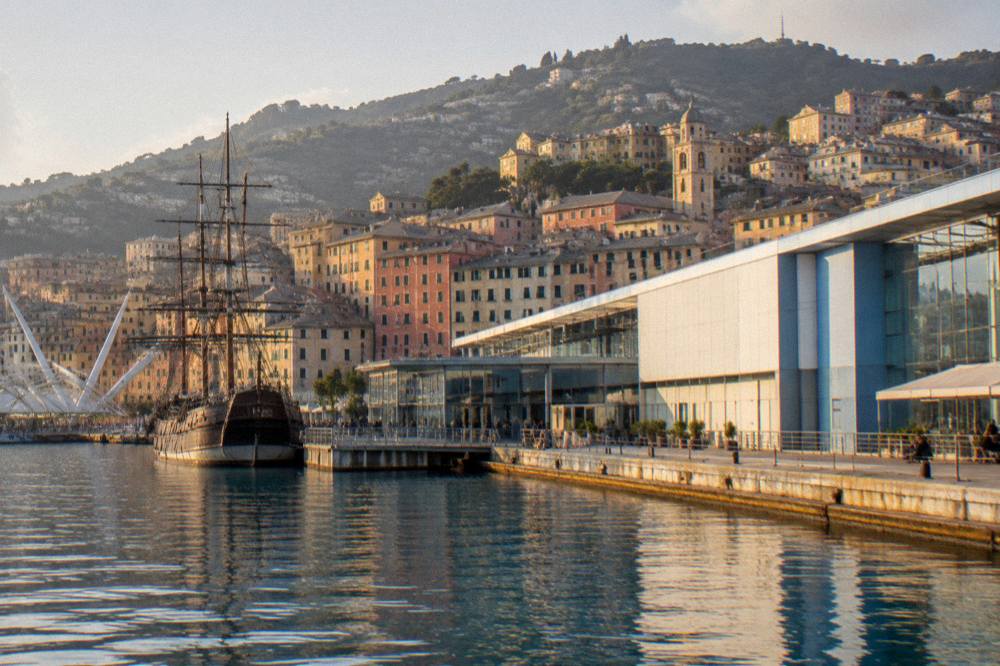 Evening light over the Porto Antico waterfront with the Aquarium building