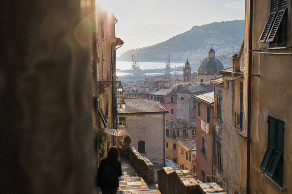A narrow medieval street in an Italian old town with no room for cars