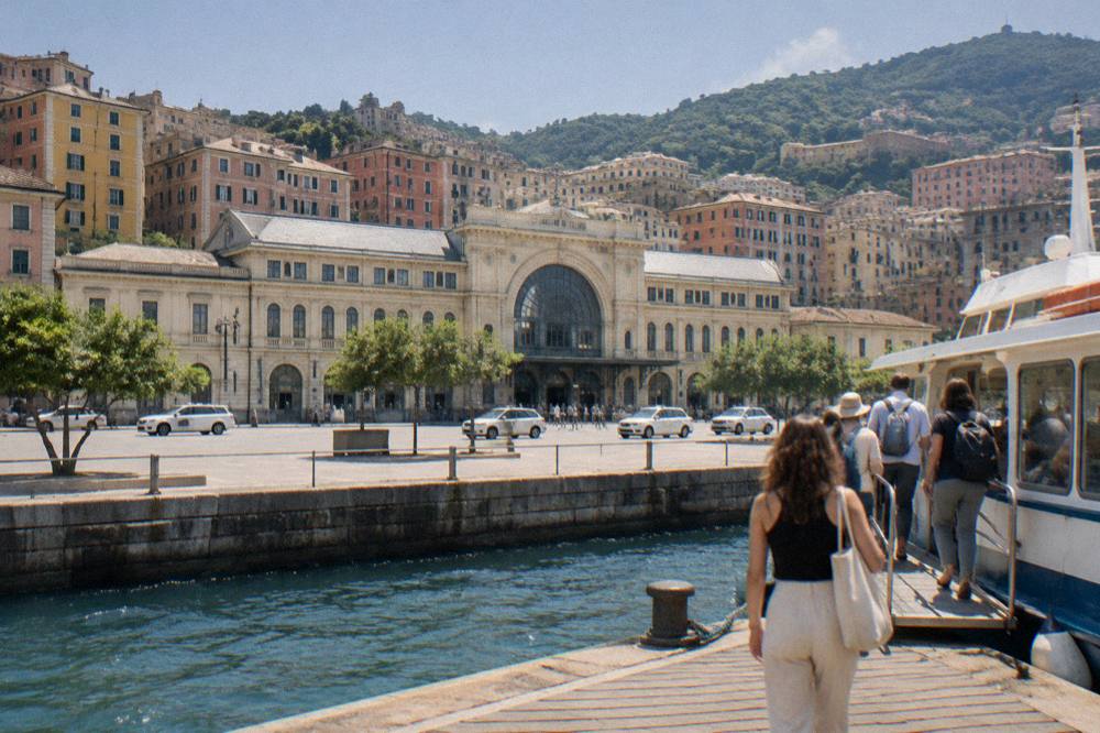 Passengers boarding a small ferry at a wooden pier on the Ligurian coast