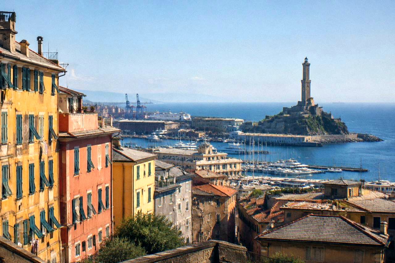 The historic harbour of Genoa with the Lanterna lighthouse in the distance
