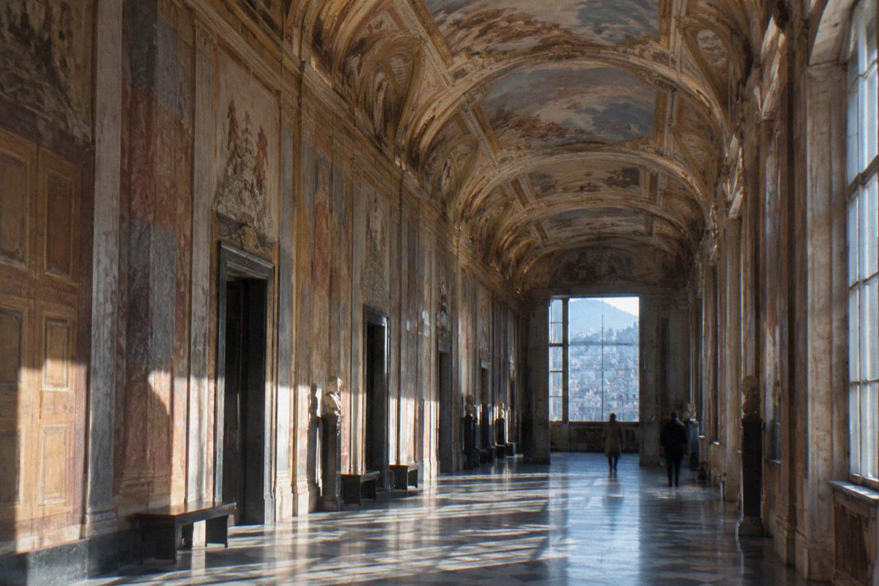 Ornate painted ceiling gallery inside a Genoa palace museum