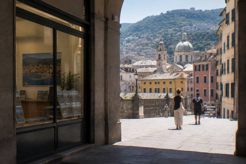 Tourist information office storefront on a Genoa arcade street