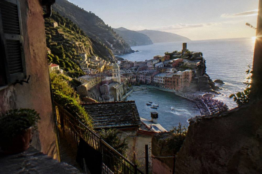 A coastline seen from a height with villages clustered around small bays