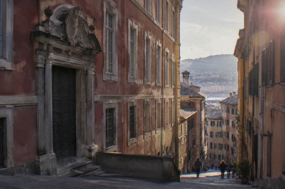 Colourful palace facades on a Strada Nuova street in Genoa