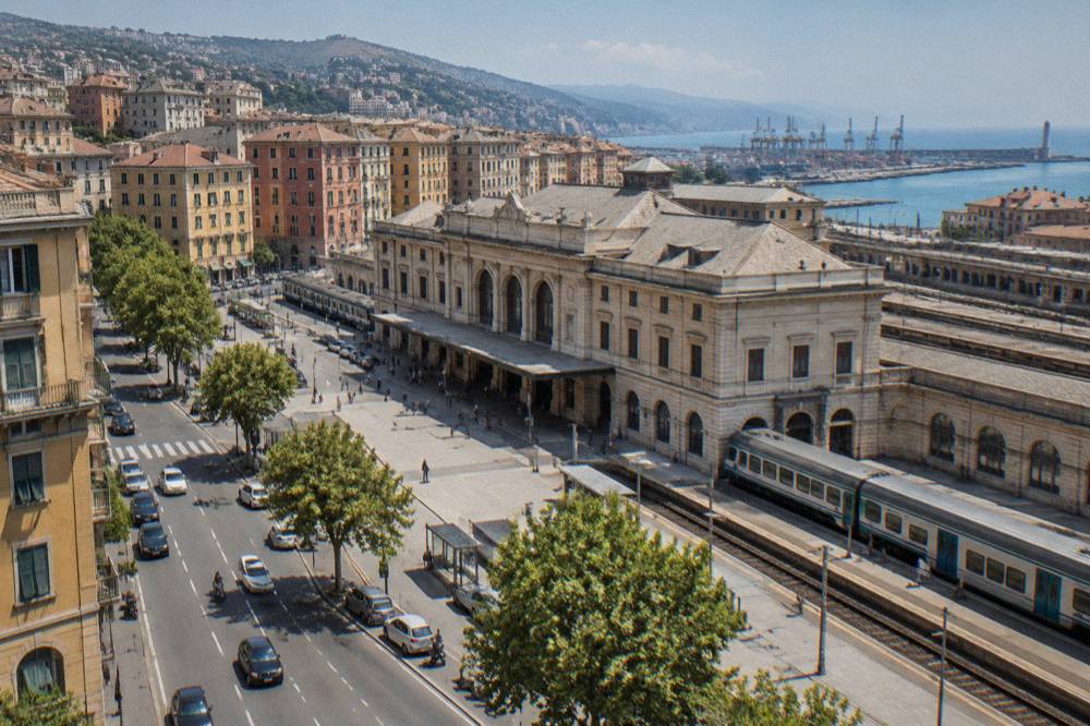 Regional train stopped at a seaside station platform on the Ligurian coast
