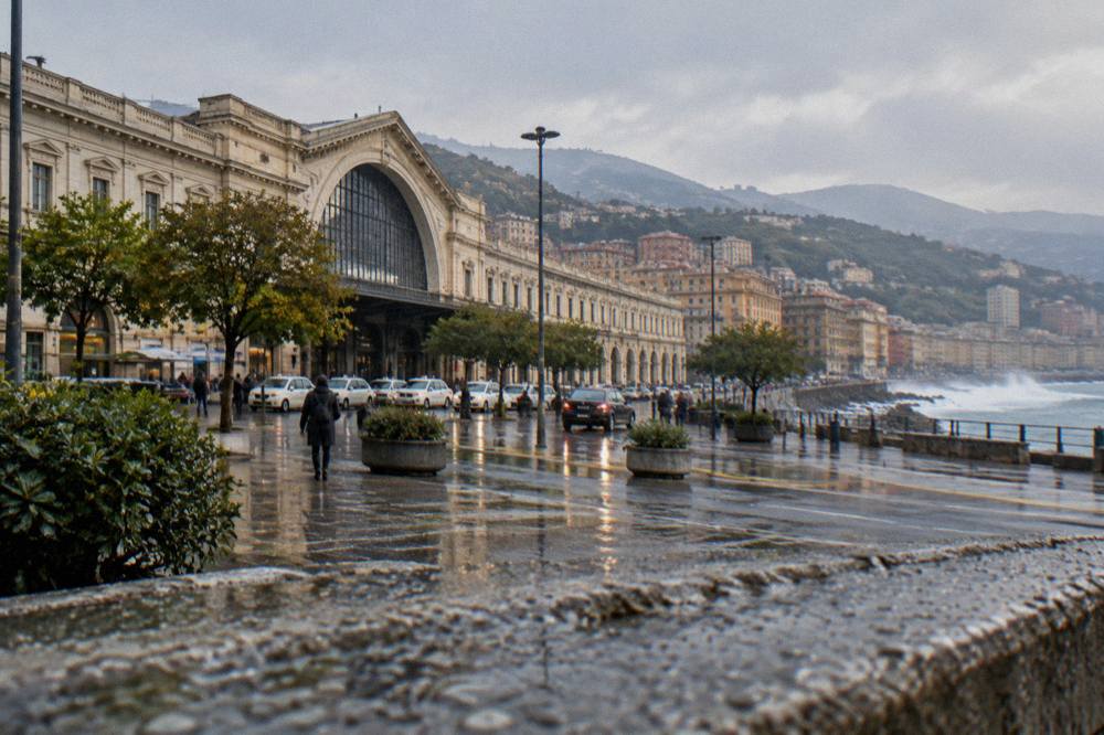 Waves breaking against a seafront promenade on the Ligurian coast