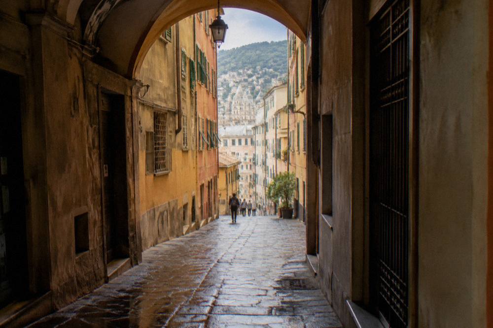 A narrow covered lane in the medieval old town of Genoa