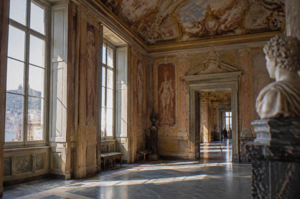 Gallery interior of a Genoese rolli palace with frescoed ceilings
