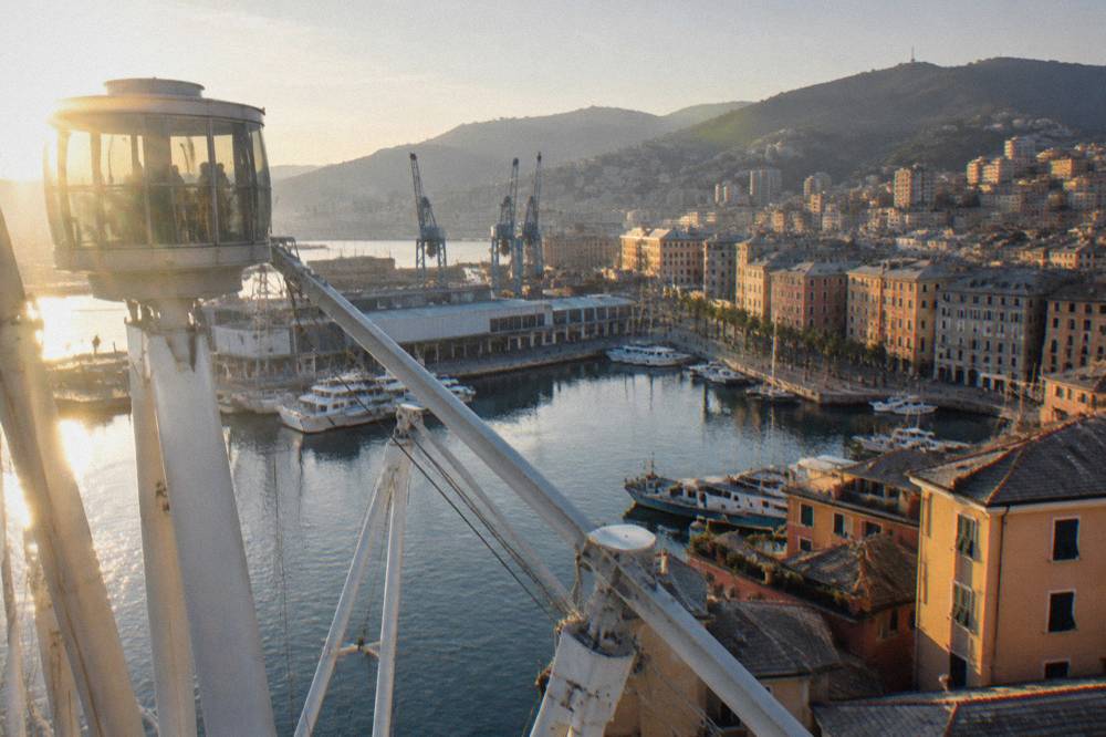 The Porto Antico old harbour of Genoa with the Bigo lift and harbour cranes
