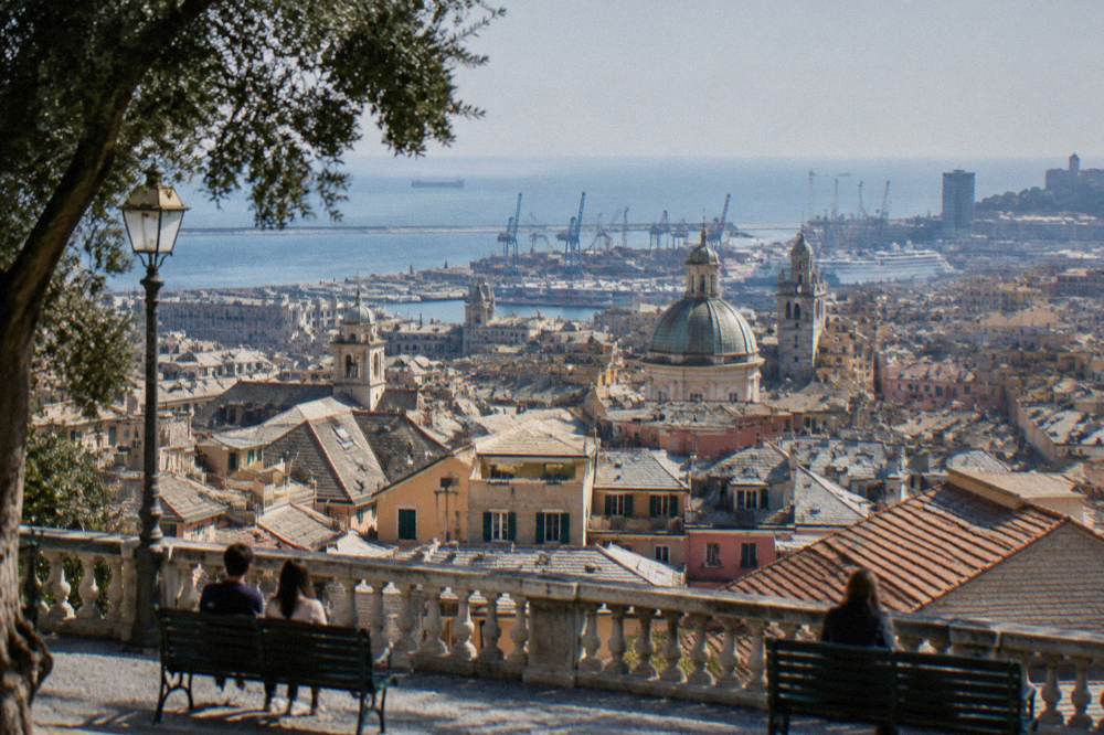 Terrace view over Genoa rooftops and the Ligurian Sea from Spianata Castelletto