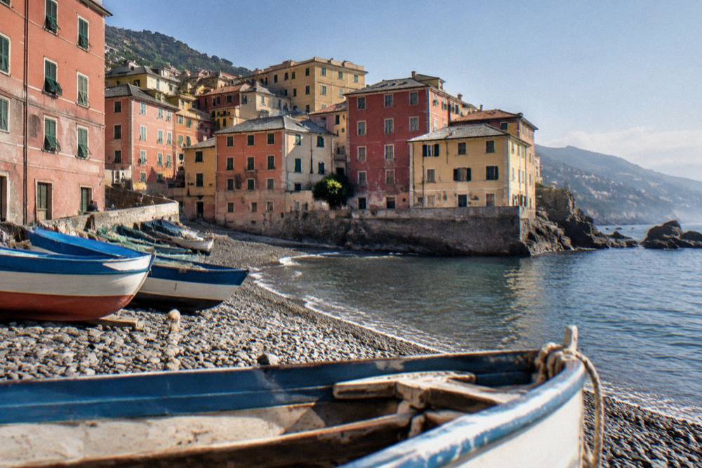 Fishing boats and colourful houses along the small beach at Boccadasse