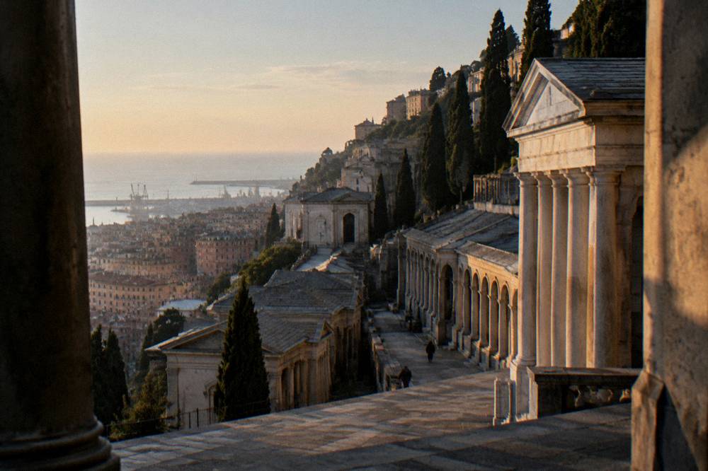 The stone terraces and monuments of Staglieno monumental cemetery on a hillside