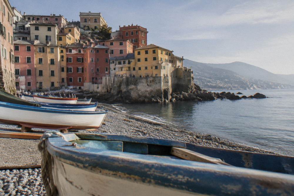 Fishing boats and coloured houses on the small beach at Boccadasse